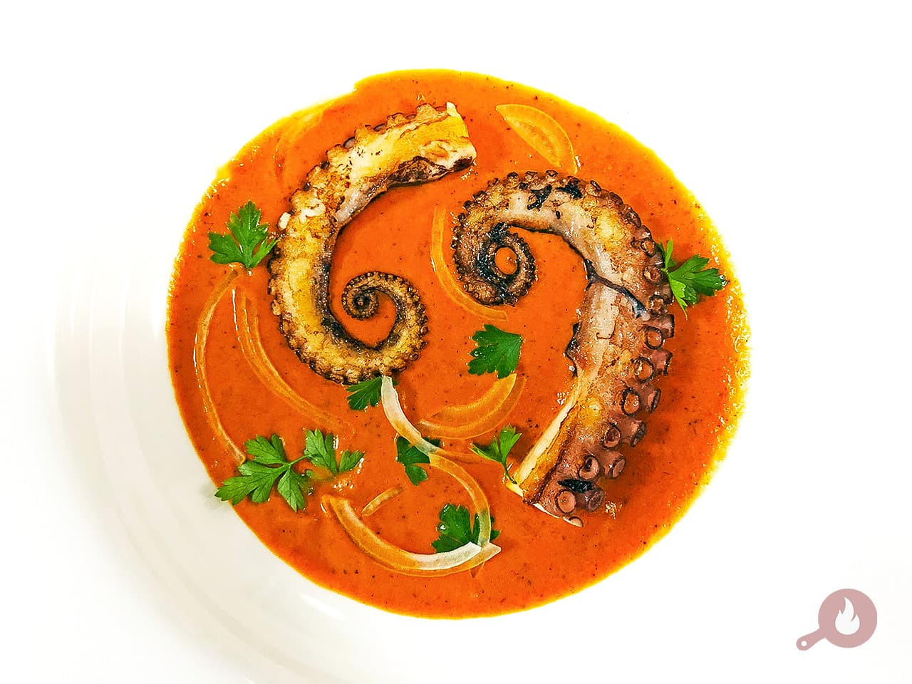 Polvo com molho romesco